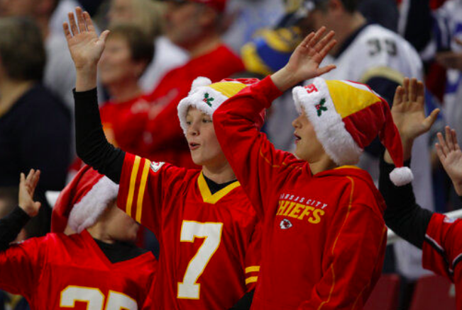 Kansas City Chiefs fans celebrate with the tomahawk chop during the fourth quarter of an NFL football game against the St. Louis Rams in St. Louis (December 19, 2010)