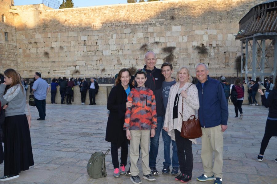 My family and I standing next to the Western Wall, the holiest site in Israel for Jews in Spring 2019.