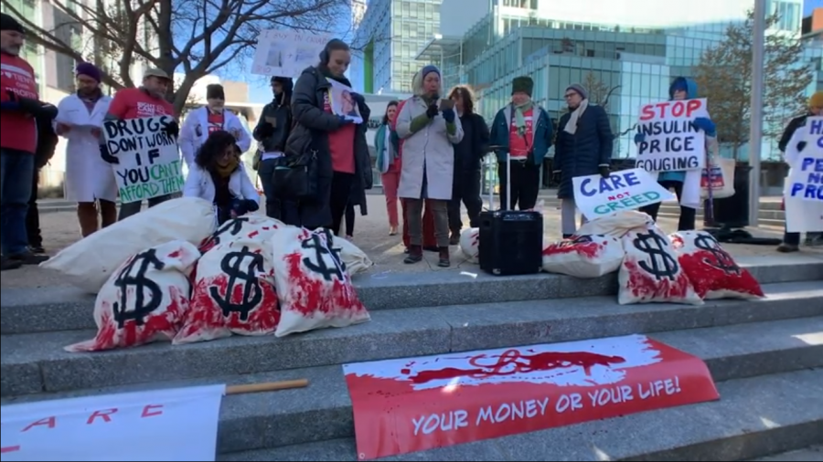 Protestors Deliver Blood Money to Eli Lillys Headquarters