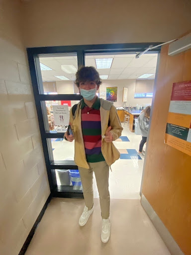 Michael McNicholas's outfit was the first one I saw in the hallway on Monday, and I was genuinely fangirling. The color scheme is so much fun to look at, as I love how he matched the tan colors with the vivid colors in his collared shirt. Overall, a 10/10.