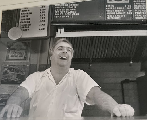 Gaby's grandfather in the pizzeria. 