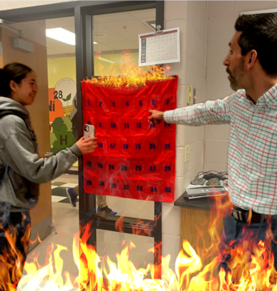 Tyrannical despot forces innocent student to obey the draconian phone pouch policy (flames added for dramatic effect)